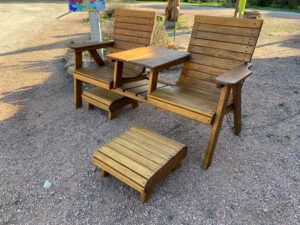 Side by Side Deck Chair features a built in table in-between the two chairs attached all in one piece. Displayed with two Hassock Footstools in from of each chair. Quality Patio Furniture Handcrafted by Jack Hudson (830) 367-3848