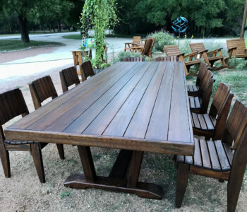Quality Patio Furniture 11 ft. Outdoor Dining Table - Dutton Style with twelve Curved Seat Dining Chairs Handcrafted by Jack Hudson (830) 367-3848 11 ft. Outdoor Dining Table - Dutton Style with ten Curved Seat Dining Chairs Quality Patio Furniture Handcrafted by Jack Hudson (830) 367-3848