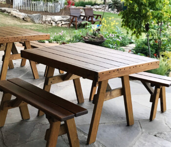 Quality Patio Furniture 4 ft. Heavy Duty Picnic Table with two 4 ft. Separate Benches is sitting on a patio looking towards a lovely garden. Handcrafted by Jack Hudson (830) 367-3848 This 4 ft. Heavy Duty Picnic Table with two 4 ft. Separate Benches is sitting on a patio looking towards a lovely garden. Handcrafted by Jack Hudson Quality Patio Furniture (830) 367-3848