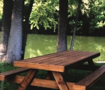 Quality Patio Furniture 8 ft. handcrafted Heavy Duty Picnic Table with Attached Benches by the river -- picnic ready. (830) 367-3848 Quality Patio Furniture 8 ft. Heavy Duty Picnic Table with Attached Benches by the river -- picnic ready.