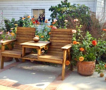 Quality Patio Furniture beautiful Side by Side Deck Chair Handcrafted by Jack Hudson (830) 367-3848 Side by Side Deck Chair on patio with fall colored blooming garden flowers and pumpkin Quality Patio Furniture Handcrafted by Jack Hudson (830) 367-3848