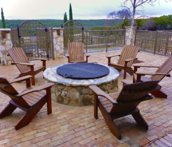 Quality Patio Furniture Curved Back Adirondack Chairs... a classic look... Handcrafted by Jack Hudson (830) 367-3848 Curved Back Adirondack Chairs on brick patio around fire pit Quality Patio Furniture Handcrafted by Jack Hudson (830) 367-3848