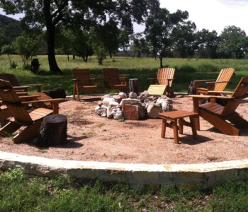 Quality Patio Furniture Curved Back Adirondack Chairs around a rustic fire pit Handcrafted by Jack Hudson (830) 367-3848 Curved Back Adirondack Chairs around a rustic fireplace! Get ready for the marshmallows! Quality Patio Furniture Handcrafted by Jack Hudson (830) 367-3848