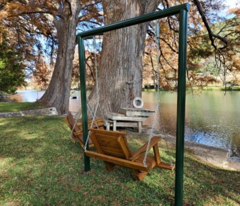 Quality Patio Furniture Porch Swing hanging on customer's frame Handcrafted by Jack Hudson (830) 367-3848 Porch Swing hanging on customer's frame Quality Patio Furniture Handcrafted by Jack Hudson (830) 367-3848
