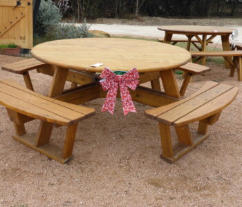 Quality Patio Furniture handcrafted Round Picnic Table with Attached Benches decorated with Red & White Bow -- Makes a great gift! (830) 367-3848 Quality Patio Furniture Round Picnic Table with Attached Benches decorated with Red & White Bow