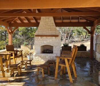 Quality Patio Furniture group of Tall Deck Chairs with Side Tables used as footstools Handcrafted by Jack Hudson (830) 367-3848 Tall Deck Chairs with Side Tables used as footstools in front of fireplace Quality Patio Furniture Handcrafted by Jack Hudson (830) 367-3848
